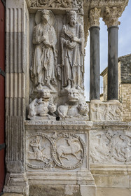 France, Gard, Saint Gilles du Gard, 12th-13th century Abbey Church of Saint-Gilles, classified as World Heritage by UNESCO under the routes to Santiago de Compostela in France, sculptures of the eastern facade of Provencal Romanesque style, corinthian capital, statue representing St. Peter on the left