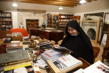 Croatia, Dalmatia, Dalmatian Coast, Sibenik, Convent of St. Lucia (samostan sv. Luce), Sister Fortunata studying in the common room