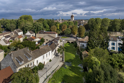 France, Cote d'Or, Climats terroirs of Burgundy listed as World Heritage by UNESCO, Beaune, the Bouzaise River at the old pont des oies and the Notre-Dame de Beaune collegiate basilica in the background (aerial view)
