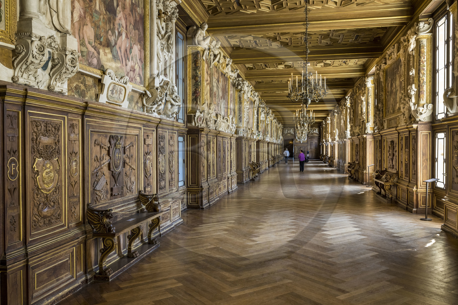 France, Seine-et-Marne, Fontainebleau, castle of Fontainebleau listed as World Heritage by UNESCO, the Francois 1er Gallery built between 1528 and 1530, decorated with paintings, paneling, frescoes and stuccos, carved walnut woodwork and a coffered ceiling