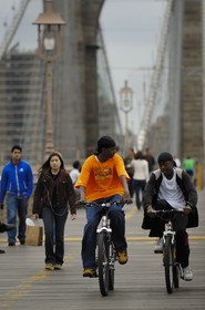 United States, New York, Manhattan, cyclist on Brooklyn Bridge