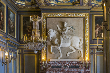 France, Seine-et-Marne, Fontainebleau, castle of Fontainebleau listed as World Heritage by UNESCO, the second Saint-Louis room or Salon du Donjon, the oldest room in the chateau, where the Languedoc marble fireplace decorated with an equestrian bas-relief representing Henri IV, made around 1600 by Matthieu Jacquet, has been moved