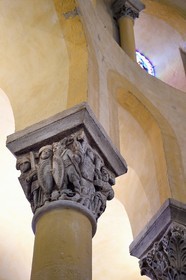 France, Puy de Dome, Clermont Ferrand, Notre-Dame-du-Port basilica in Auvergne Romanesque style, listed as a UNESCO World Heritage Site under the Routes of Saint-Jacques-de-Compostelle in France, choir capital representing the battle of charity against greed