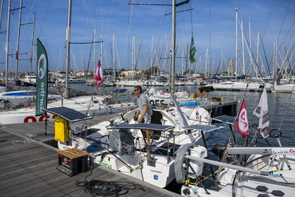 France, Vendee, Les Sables d'Olonne, Port Olona, Vendée Globe sailboat pontoon, Mini 6.50 class monohull regatta sailing boat preparing to participate at the minitransat, the skipper Hugo Cardon