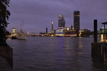 United Kingdom, London, HQS Wellington on Victoria embankment, the skyscrapers Shard and One Blackfriars in the background
