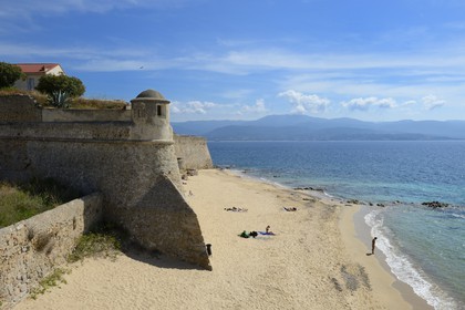 France, Corse du Sud, Ajaccio, watch turret and walls of the Citadel on the old town beach