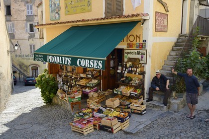 France, Haute Corse, Corte, the epicerie Casa Curtinese hold by Jean-Marie Ghionga (with the white hat),  a shop of corsican specialities