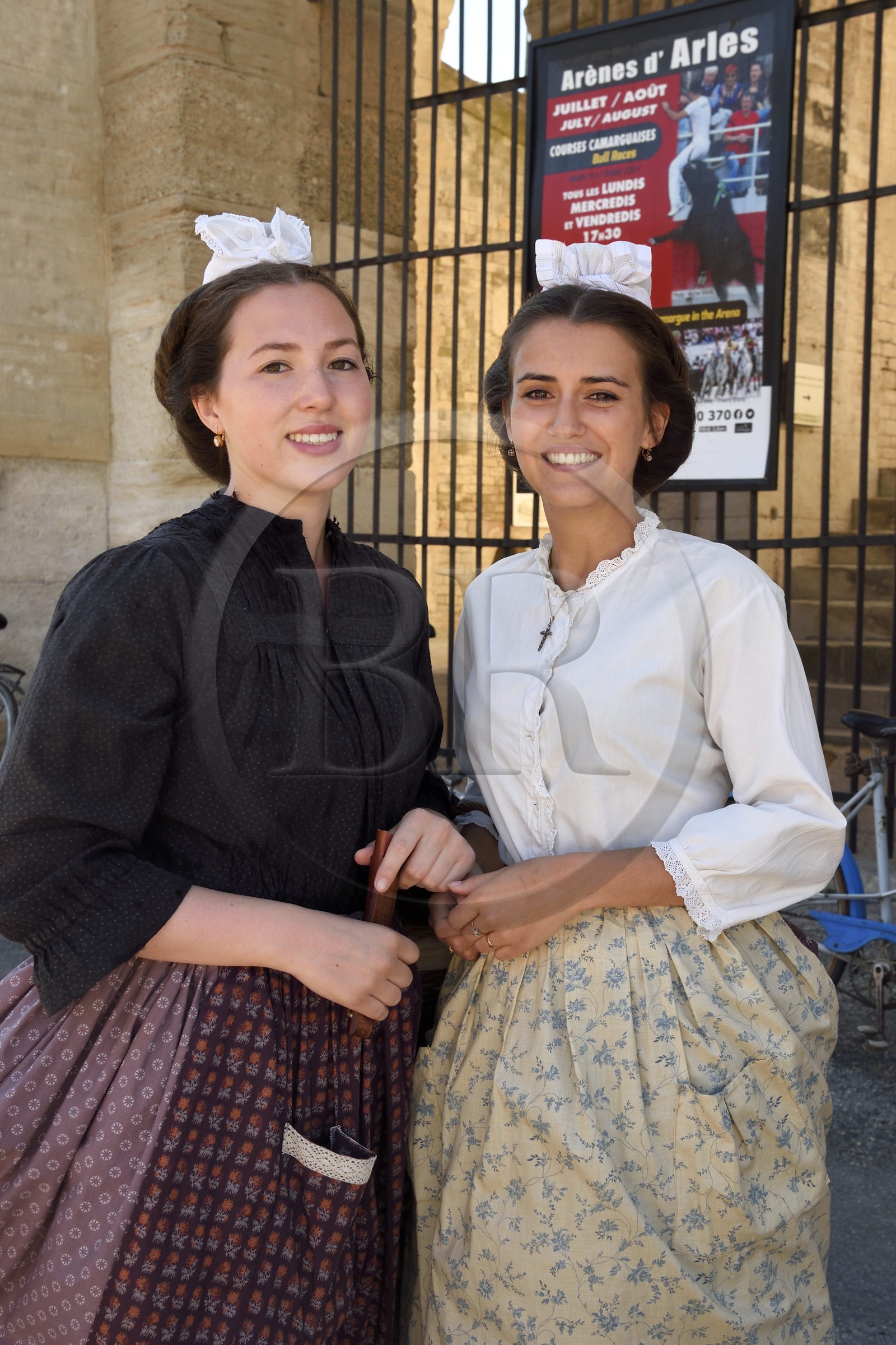 France, Bouches du Rhone, Arles, the course camarguaise of the Cocarde d'Or at the Arenas, young Arles inhabitants in traditional costume France, Bouches du Rhone, Arles, the course camarguaise of the Cocarde d'Or at the Arenas, young Arles inhabitants in traditional costume