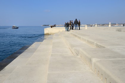 Croatia, Dalmatia, Dalmatian Coast, Zadar, Sea organ architectural musical instrument created by Nikola Basic, the sound emerges from the holes along the top step