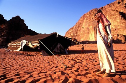 Jordan, Wadi Rum, Bedouin in front of his tent