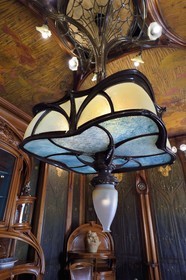 France, Meurthe-et-Moselle, Nancy, Ecole de Nancy Museum, the Art Nouveau dining room of Masson (1903-1906), furniture and woodwork by Eugène Vallin, leather panels and ceiling by Victor Prouvé, the chandelier