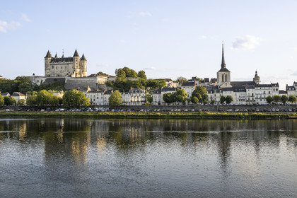 France, Maine-et-Loire, Loire valley listed as World Heritage by UNESCO, Saumur, the castle and the church of Saint-Pierre on the banks of the Loire river