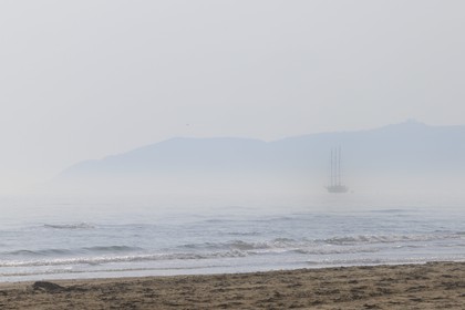 Morocco, Oriental Region, Mediterrania Saidia Seaside Resort, boat anchored off the beach