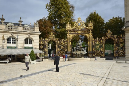 France, Meurthe-et-Moselle, Nancy, Place Stanislas (former Place Royale) built by Stanislas Leszczynski in the 18th century, listed as World Heritage by UNESCO, Amphitrite Fountain and golden gate by Jean Lamour