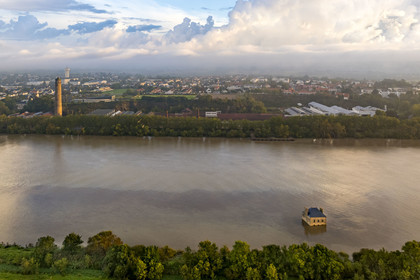 France, Loire Atlantique, Coueron, open-air contemporary art collection Estuaire, La Maison dans la Loire (The House in the Loire river) created by the artist Jean-Luc Courcoult and the 69 m high Shot Tower built in the 19th century (aerial view)