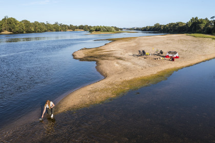 France, Maine-et-Loire, Loire valley listed as World Heritage by UNESCO, cycling along the banks of the Loire, camping for the night on one of the sandbanks forming islands on the Loire (aerial view)