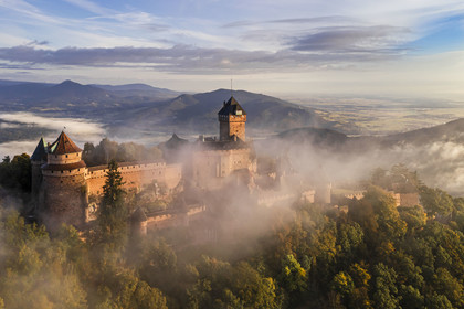 France, Bas Rhin, Orschwiller, Alsace Wine Road, Haut Koenigsbourg Castle and the plain of Alsace in the background right (aerial view)