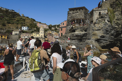 Italy, Liguria, Cinque Terre National Park listed as World Heritage by UNESCO, village of Vernazza, disembarkation of passengers from the liaison boat
