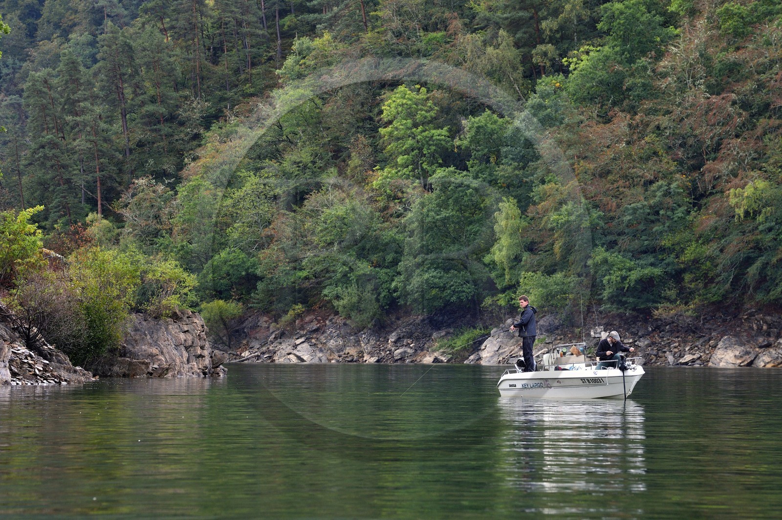 France, Cantal, Gorges de la Truyere (Truyere river canyon), Ruynes-en-Margeride, anglers on the river Truyere upstream of the Garabit viaduct