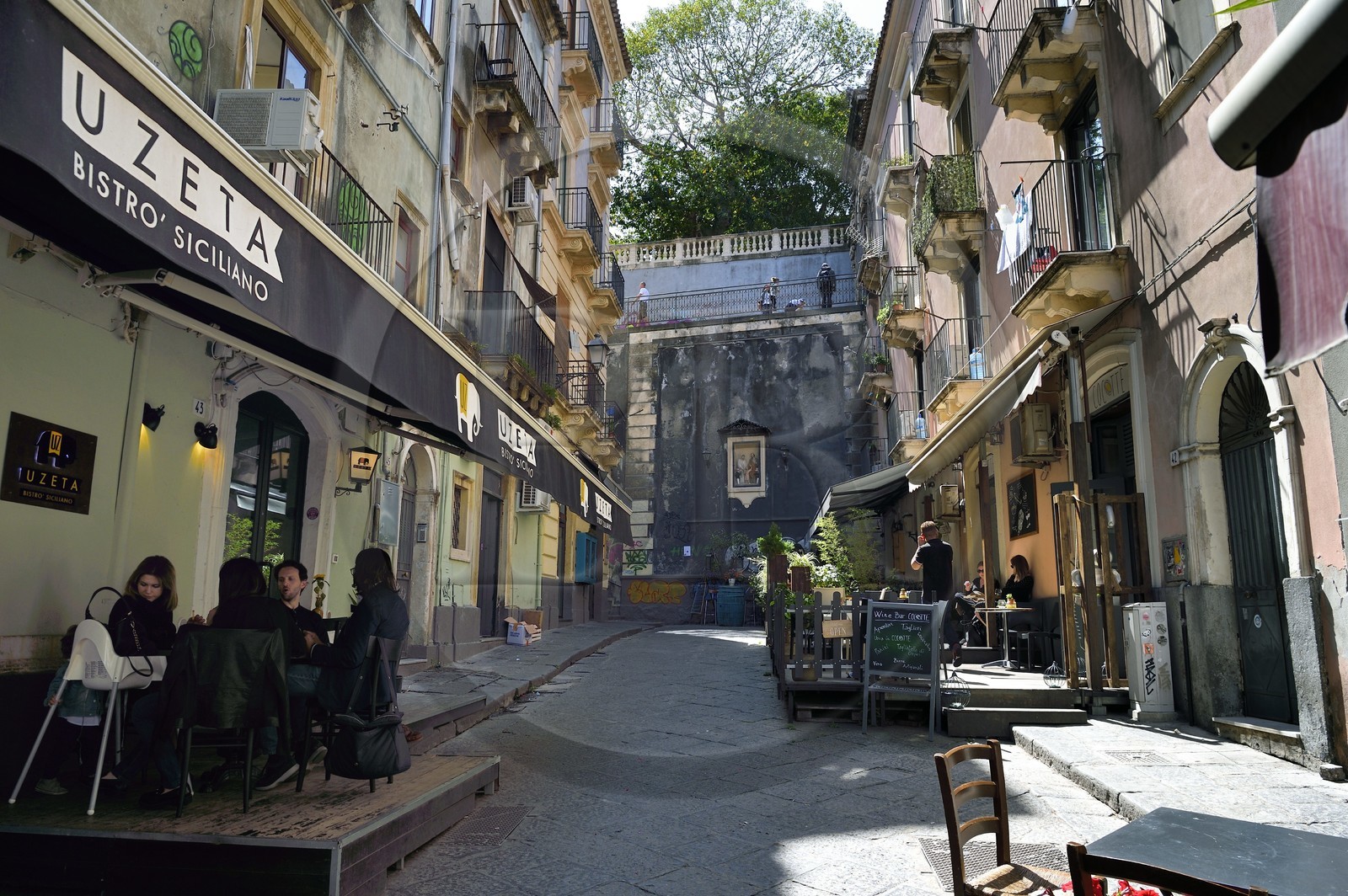 Italy, Sicily, Catania, Baroque city listed as UNESCO World Heritage, restaurants terraces in Via Penninello