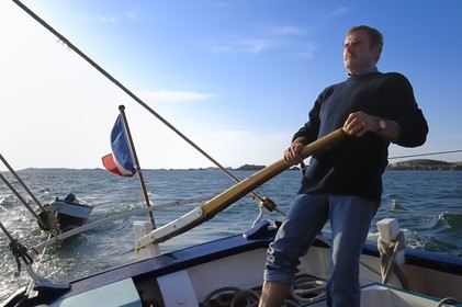 France, Manche, Iles Chausey, Gilbert Hurel and his boat, the Courrier des Iles