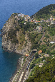 Italy, Liguria, Cinque Terre National Park listed as World Heritage by UNESCO, the village of Corniglia located at the top of a promontory overlooking the Mediterranean Sea at an altitude of about 100 m and its train station accessible by stairs