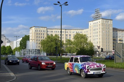 Germany, Berlin, Karl-Marx Allee is the largest artery of the country leading from Alexanderplatz to Frankfurter Tor and the communist regime annually paraded his army there, new look Trabant car