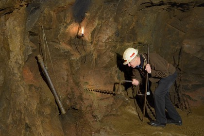 France, Moselle, Fensch Valley, Neufchef, Antoine Bach spent 36 years underground as miner chief in the galleries of the old iron mine of Hayange, drill a hole to put the powder and make the rock explode