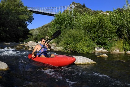 France, Herault, Orb valley, kayaking the river Orb at the moulin de Travassac next to Mons la Trivalle, Sylvain Cathala from Ateliers Rivière Randonnees