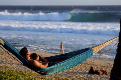 France, Ile de la Reunion, Petite-Ile sur la côte sud, plage de Grand-Anse, hamac tendu entre deux palmiers
