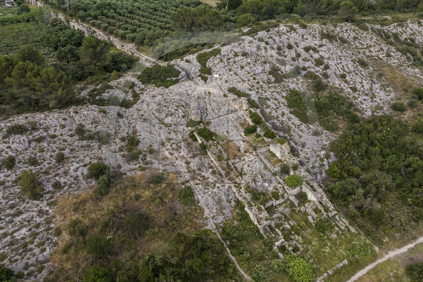 France, Bouches du Rhone, Fontvieille, chemin de Caparon, Gallo-Roman remains of the Barbegal flour mill (created at the beginning of the 2nd century) would have produced flour for the city of Arles with its two series of eight wheat mills supplied by a diversion of the Barbegal Aqueduct (aerial view)