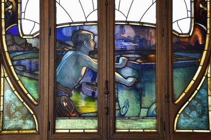 France, Meurthe et Moselle, Nancy, Art Nouveau building of the Chamber of Commerce and Industry (CCI), stained glass on the ground floor representing the strengths of Lorraine industry designed by Jacques Gruber, iron exploitation and work