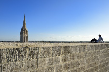 France, Calvados, Caen, the ducal castle of William the Conqueror, the ramparts and the bell tower of the St. Peter (Saint-Pierre) church in the background