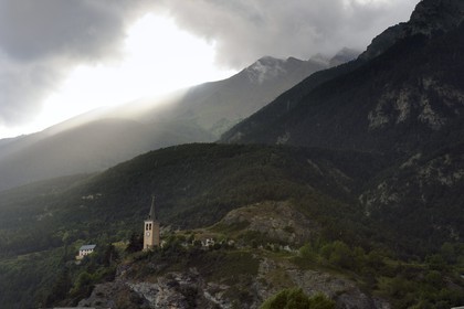 France, Alpes de Haute Provence, Ubaye valley, Jausiers, the church bell tower and cemetery above the village