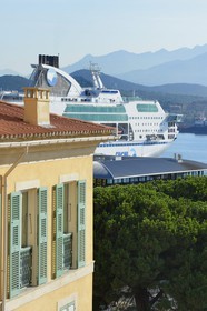 France, Corse du Sud, Ajaccio, building in the city center and ferry boat at dock