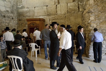 Israel, Jerusalem, holy city, the old town listed as World Heritage by UNESCO, covered part of the Western Wall part of the retaining walls of the Temple Mount built by Herod the Great, Orthodox Jews praying
