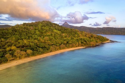 France, Mayotte island (French overseas department), Grande-Terre, Kani-Keli, the Maore Garden and the beach of N'Gouja, Mount Choungui in the background (aerial view)