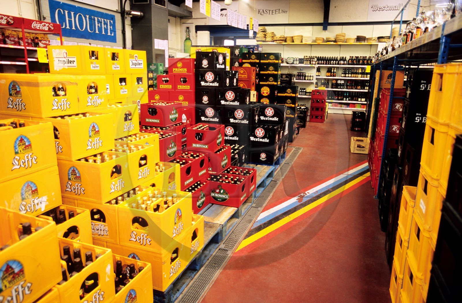 Belgium, Flanders, Baarle-Hertog   Baarle-Nassau village. the border between Belgium and Netherlands is marked on the ground and passes in the middle of the shop of alcohol (which possesses two cash desk)