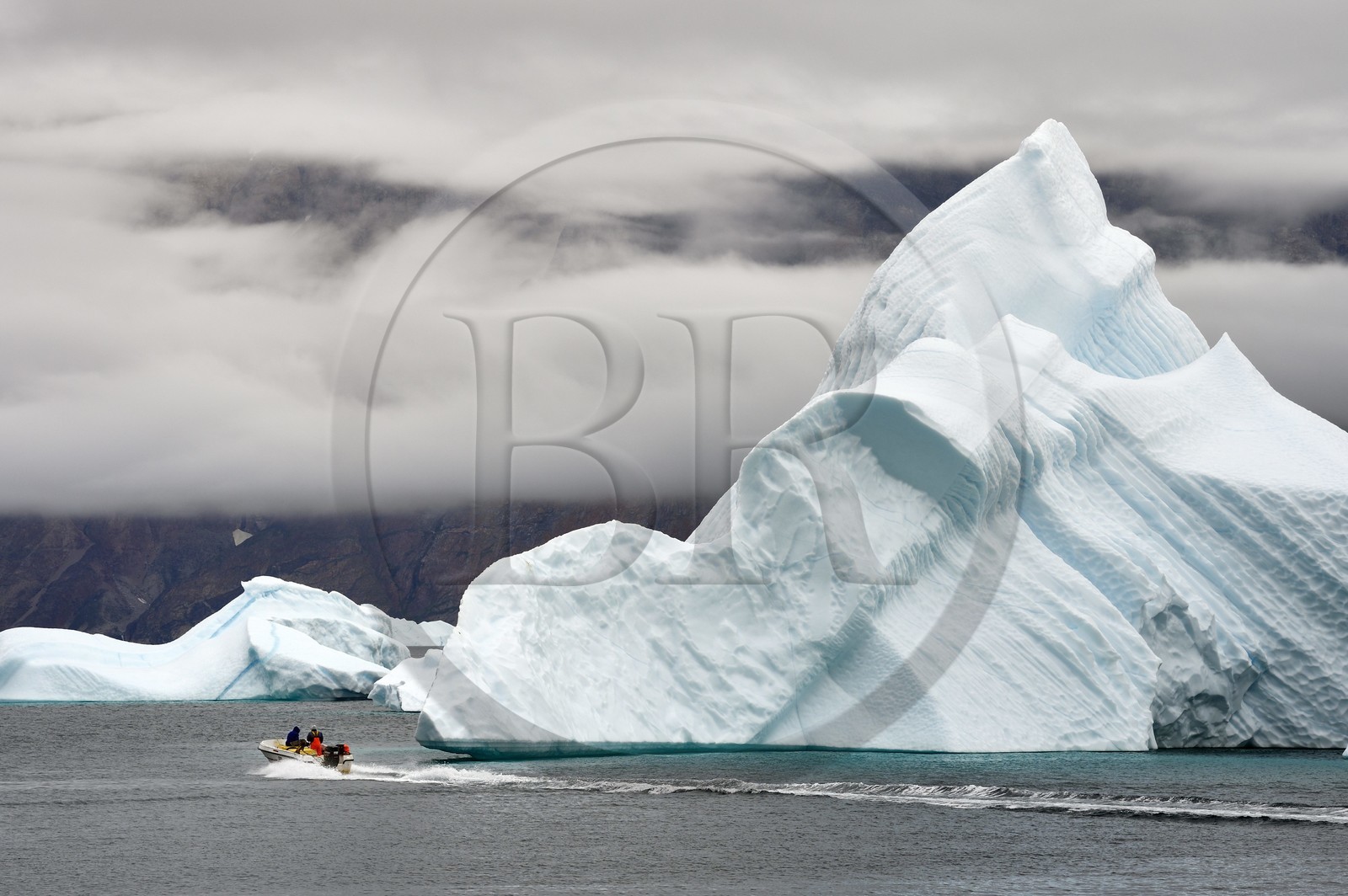 Greenland, west coast, Baffin bay, fishing in front of icebergs in Uummannaq fjord