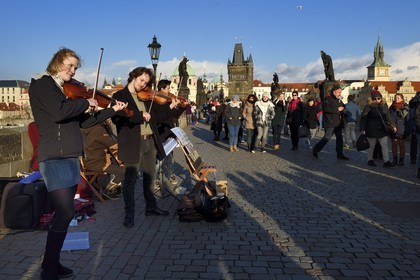 Czech Republic, Prague, historical centre listed as World Heritage by UNESCO, violinists concert on the Charles Bridge over Vltava River