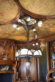 France, Meurthe-et-Moselle, Nancy, Ecole de Nancy Museum, the Art Nouveau dining room of Masson (1903-1906), furniture and woodwork by Eugène Vallin, leather panels and ceiling by Victor Prouvé, the chandelier