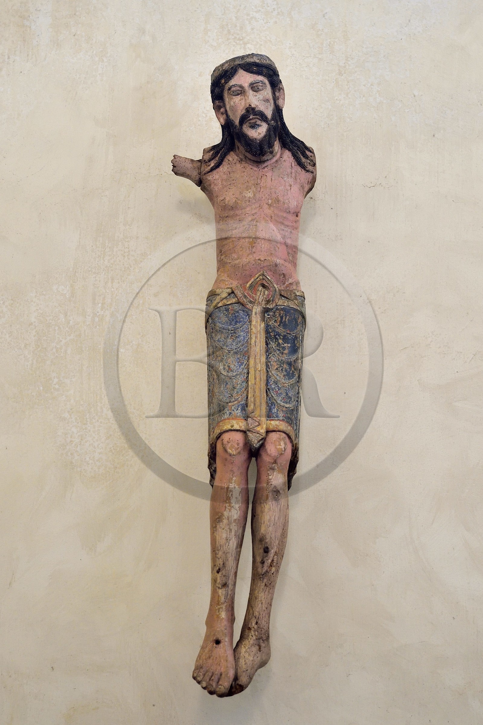 France, Haute Loire, Blesle, labelled Les Plus Beaux Villages de France (The most beautiful villages of France), Saint Pierre church in Auvergne Romanesque style, Cluniac site, Christ on the cross in polychrome wood (12th century)
