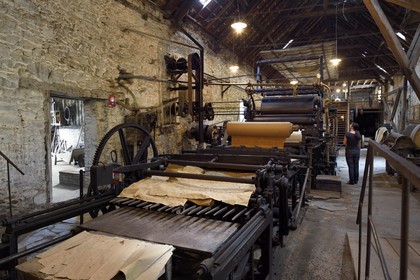 France, Dordogne, Périgord Noir, Payzac, former Papeterie de Vaux, Ecomuse e European paper straw piles Dutch and heating cylinders, Production of stationery Vaux is the manufacture of paper from rye straw, mainly used in food and packaging