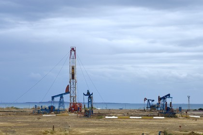 Azerbaijan, Baku, oil wells in an extraction field on the outskirts of the city