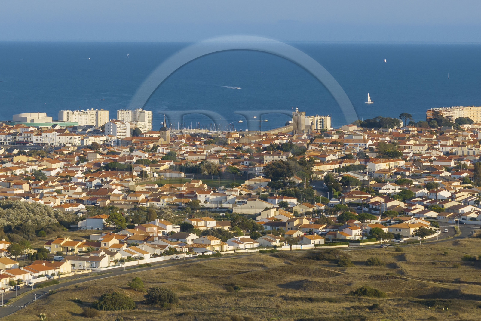 France, Vendee, Les Sables d'Olonne, the La Chaume district in the foreground and the 14th century Arundel Tower (aerial view)