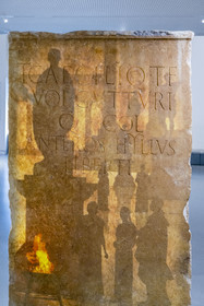 France, Gard, Nimes, Romanity museum (Musée de la Romanite) by architect Elizabeth de Portzamparc, epigraphic collection of stelae with honorary, dedicatory and funerary inscriptions, with enhancement and explanatory projection