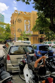 Vietnam, Hanoï, rest on a motorbike in front of the art deco privat hospital from 1936 in Ly Thuong Kiet street