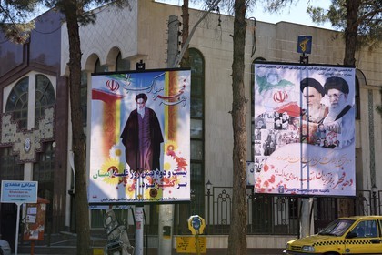 Iran, Isfahan province, Dasht-e Kavir desert, city of Nain also known as Naein, posters honoring both the Revolution guides Ayatollah Khomeini and Ayatollah Khamenei (right)