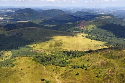 France, Puy de Dome, Parc Naturel Régional des Volcans d'Auvergne (regional nature park of Auvergne volcanoes), the northern part of the Chaine des Puys listed as World heritage by UNESCO, the path leading to the Traversin and the Puy Pariou crater