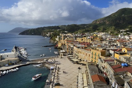 Italy, Sicily, Aeolian Islands, listed as World Heritage by UNESCO, Lipari Island, Lipari, Marina Corta fishing port and San Giuseppe church, Anime del Purgatorio church left on the pier